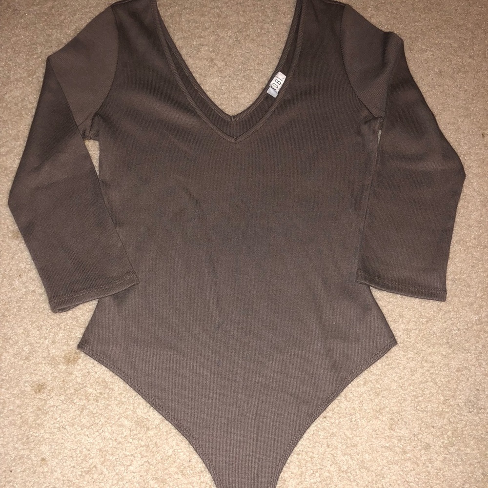 Brown body suit